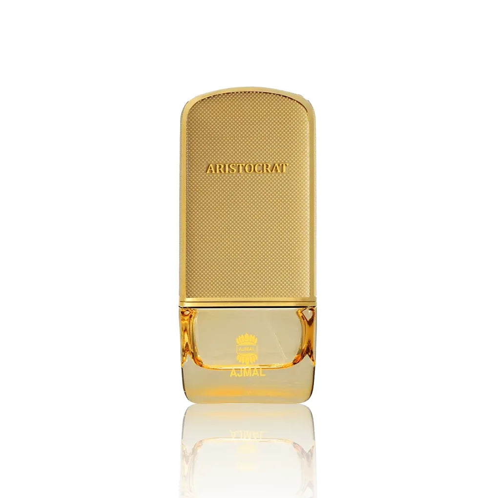 Ajmal Aristocrat Coral Eau de Parfum 75 ml – eleganter goldener Flakon auf weißem Hintergrund.