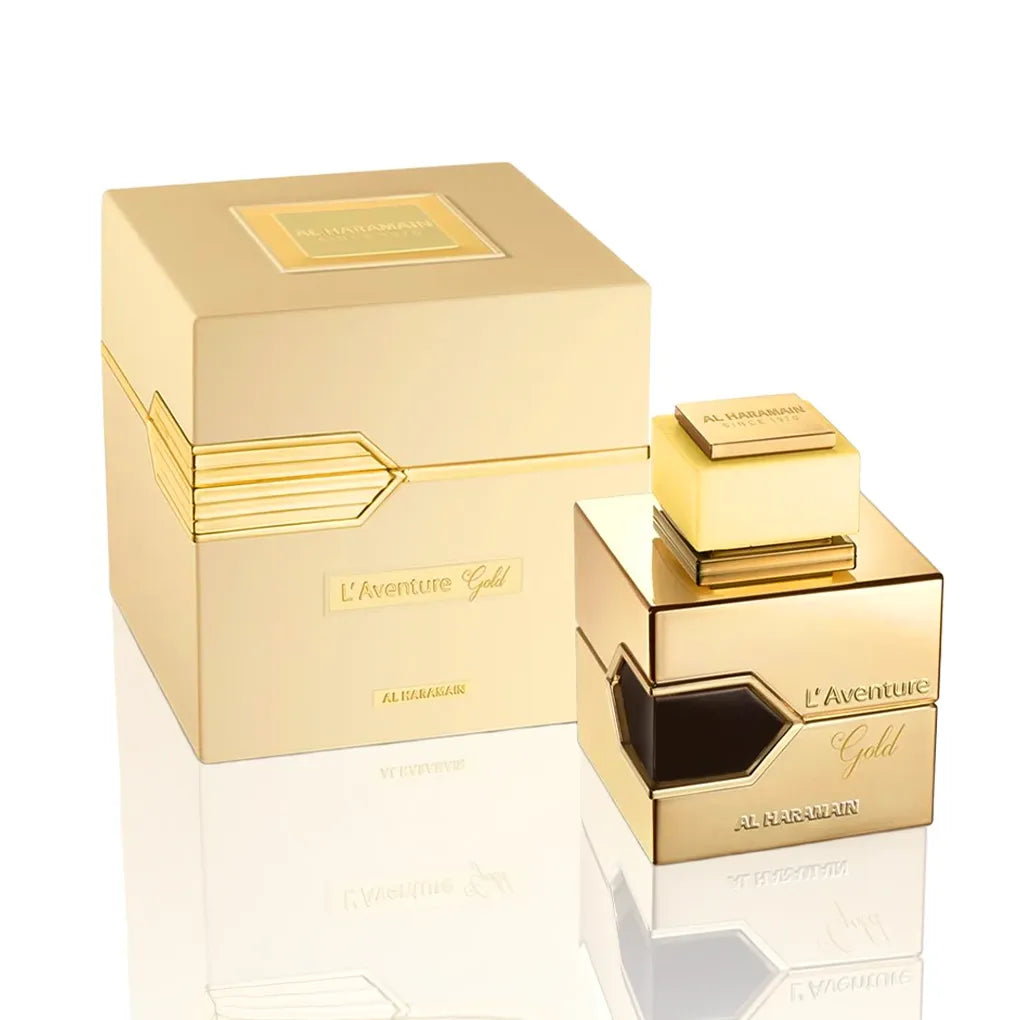 Al Haramain L’Aventure Gold Eau de Parfum Flakon mit Verpackung Frontansicht auf weißem Hintergrund.