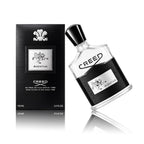 Creed Aventus for Men Eau de Parfum Spray 100 ml Flakon mit Originalverpackung auf weißem Hintergrund der Flakon ist nach links gekippt