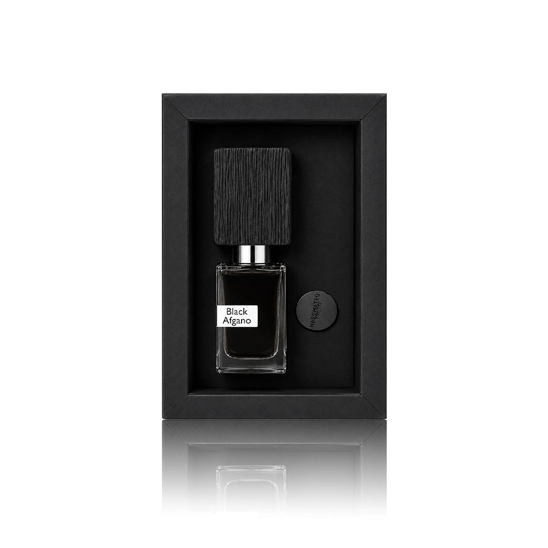 Nasomatto Black Afgano Extrait de Parfum 30 ml Flakon mit Originalverpackung auf weißem Hintergrund mit der Flasche in der Box