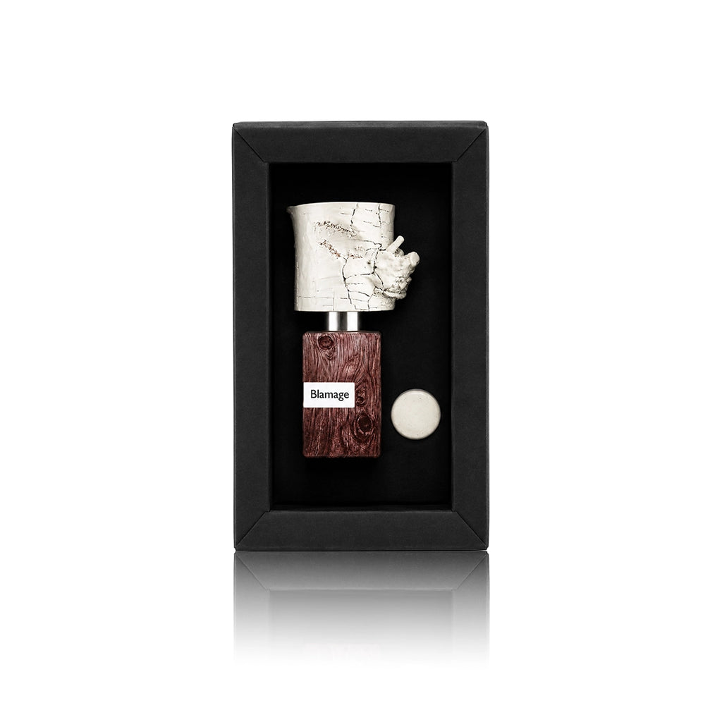 Nasomatto Blamage Extrait de Parfum 30 ml Flakon mit Originalverpackung auf weißem Hintergrund mit der Flasche in der Box