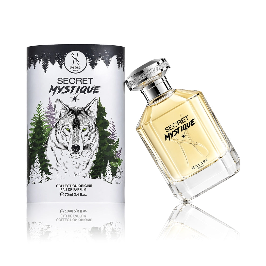Hayari Secret Mystique Eau de Parfum 70 ml Flakon mit Originalverpackung auf weißem Hintergrund der Flakon ist nach links gekippt